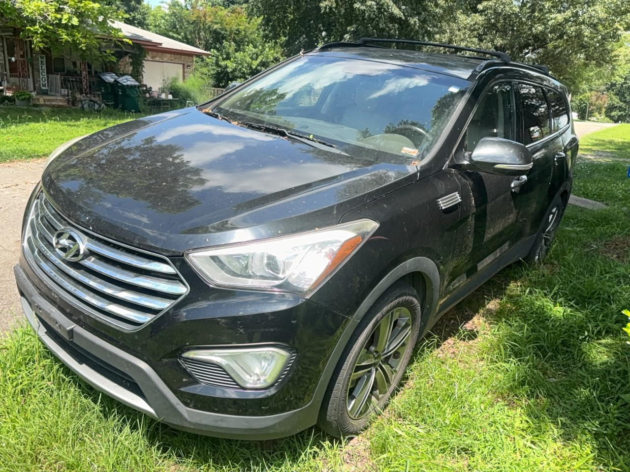 Damaged Hyundai Santa Fe SUV bought by Fremont wrecked car buyer